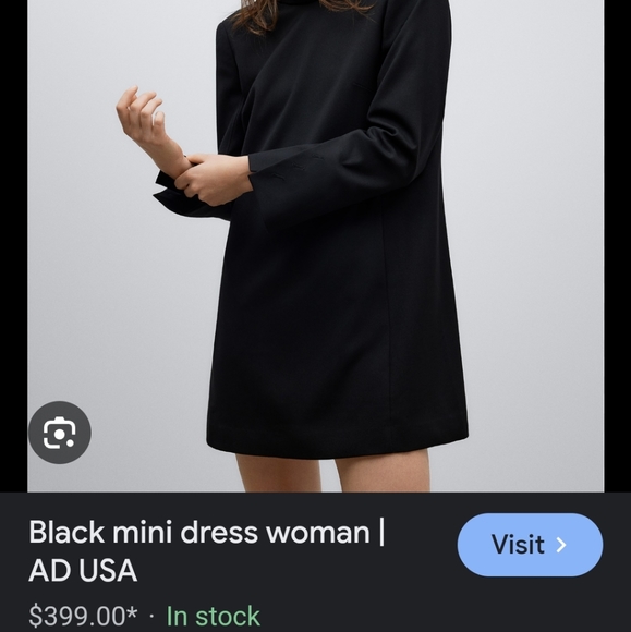 Adolfo Dominguez is a black sophisticated dress. - Picture 6 of 8